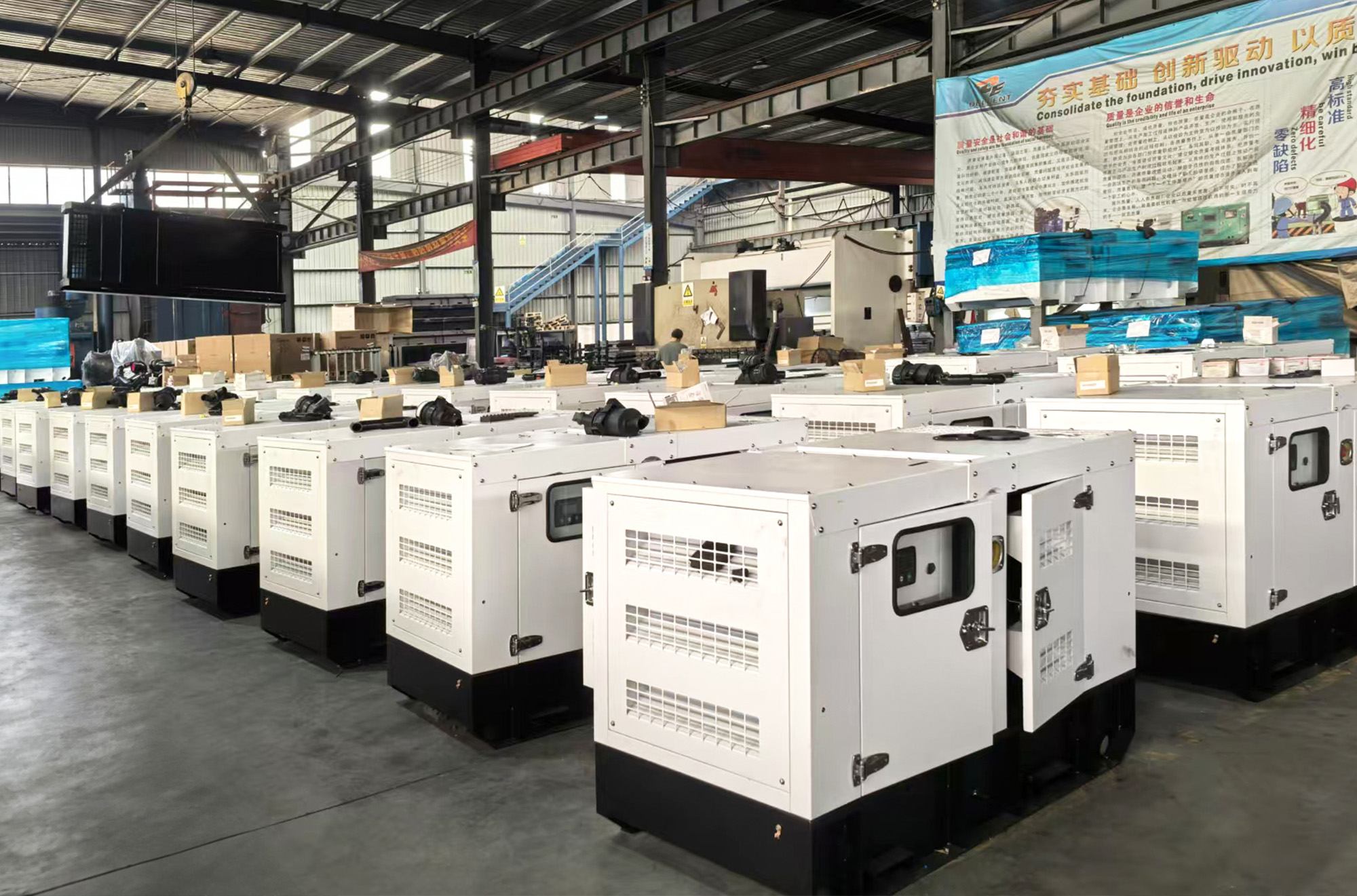Rows of heavy-duty white silent canopy diesel generators aligned on the factory floor, highlighting precision engineering and quality control of a professional power generator supplier.